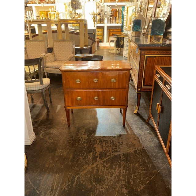 The 19th c. German Biedermeier Walnut Chest is a stylish and functional piece of furniture. Made of high-quality walnut,...