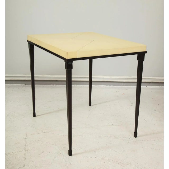 Bespoke parchment-top table with iron base. One currently in stock.