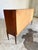Extraordinary tall Danish teak credenza, featuring beautifully tapered legs, angled corners and plenty of storage...