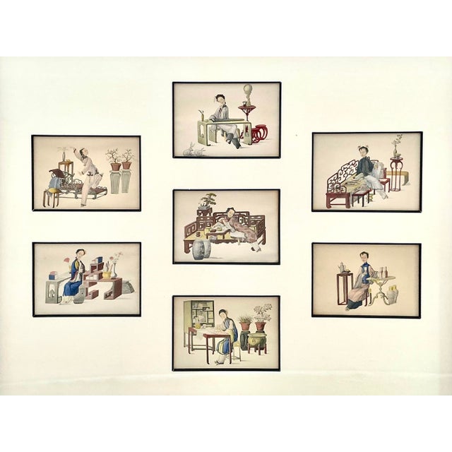 Set of Seven Chinese Export Paintings on Paper, each depicting refined domestic scenes, elegantly arranged within a...