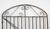Antique wrought iron garden gate featuring an arched top and decorative scrollwork. Good condition with surface wear,...