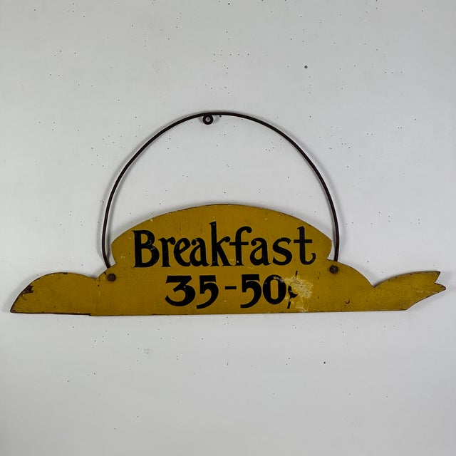 A whimsical vintage yellow wood sign circa Early - Mid 20th Century, advertising breakfast for 30-50 cents. Not a bad deal...