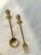 Elegant set of twelve, stainless steel, gold plated, ornate, appetizer forks and spoons each inset with a blue porcelain...