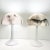 Chic pair of 1970s modern mushroom lamps by Gilbert with striking black, grey, and white marbled shades on molded plastic...