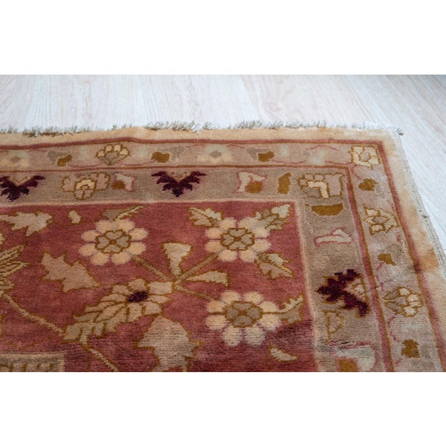 Hand-knotted in wool, this 14 x 20 Talia Oriental rug carpet is a refined addition to our contemporary oversized rug...