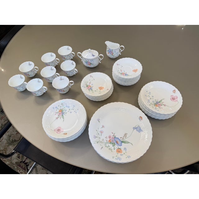 Design Plus Gallery presents a 47-Piece Set of “Something Blue” Bone China, Pattern A7051 from Mikasa. The collection is...