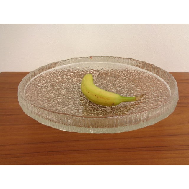 Large glass bowl by Tapio Wirkkala for Iittala from the 1960s. Very nice, fully live-in condition. This piece has an...