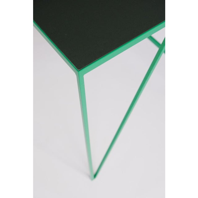 This large Study desk is made with a green powder-coated steel frame and a deep green linoleum top made from all-natural...