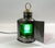 Steel boat bow lantern. Glass Fresnel lens in red and green. Steel case with brass cap. Also fitted with a carry ring....