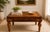 A beautiful pair of vintage solid wood end tables showcasing timeless traditional styling and exceptional craftsmanship....