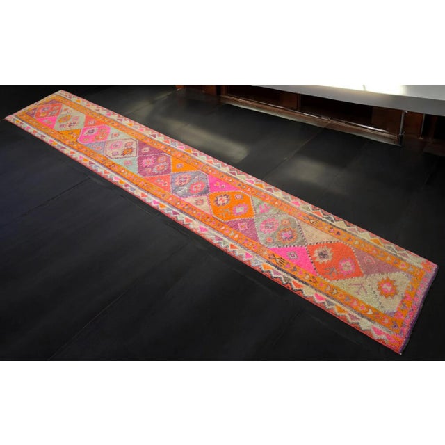 Offered is an one of a kind Turkish Oushak runner rug, made in Anatolia approximately 50-60 years ago. The beautiful wool...