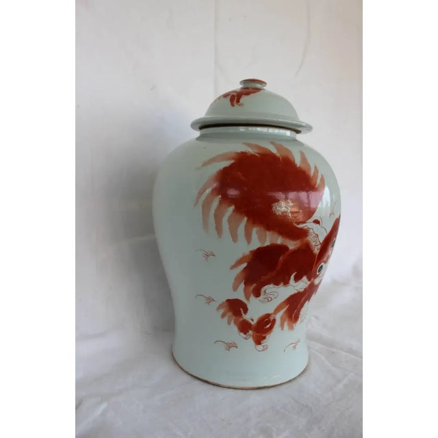 Asian Orange and White Jar. Circa Mid 20th Century.