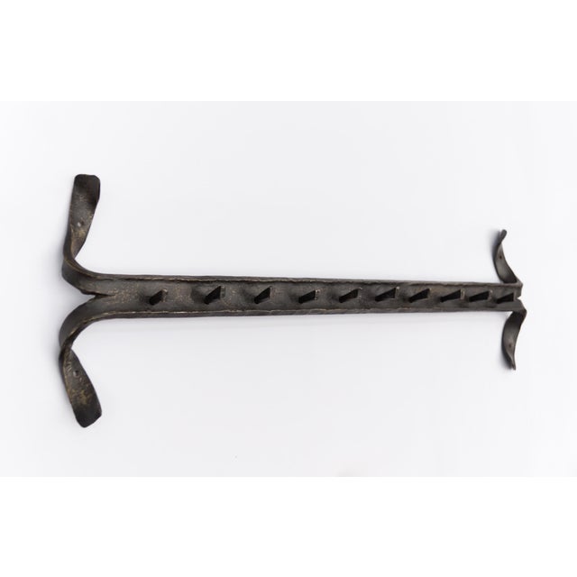 Hand forged wall coat rack in very good condition.