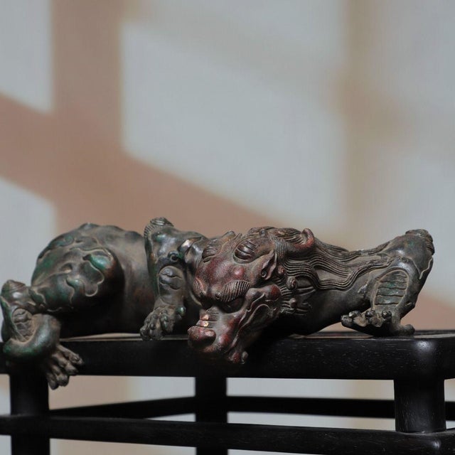 This is a striking vintage Chinese gilt bronze sculpture of a mythical beast, traditionally known as a "Water-Absorbing...