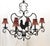 Large vintage wrought iron chandelier features scrollwork and a prominent center rooster silhouette making it ideal for a...