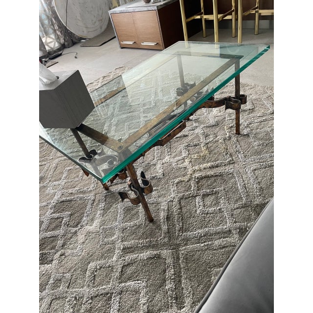 Gilded iron base with scroll fleur d lis like detail, topped with rectangular glass. Made In Spain circa 1950s. All offers...