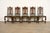 A beautiful set of five antique English Jacobean or Tudor style dining chairs By Berkey & Gay USA, Circa 1920s Carved...