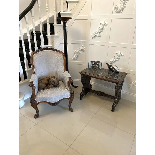 Unusual antique victorian quality carved walnut and marble top italian coffee table having a rectangular shaped carved...