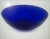 Striking vintage cobalt-blue art glass bowl featuring a clean, gracefully rounded form and rich saturated color. The deep...