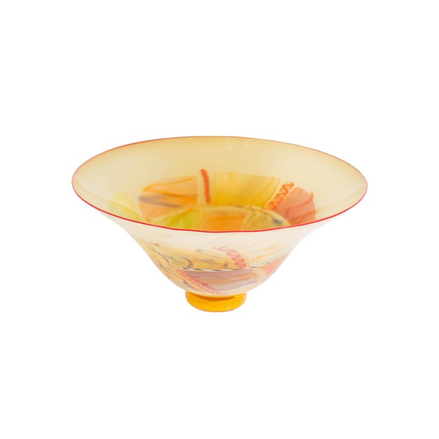 A large art glass centerpiece bowl by American glass artists Bruce Pizzichillo and Dari Gordon, a glass blowing duo that...