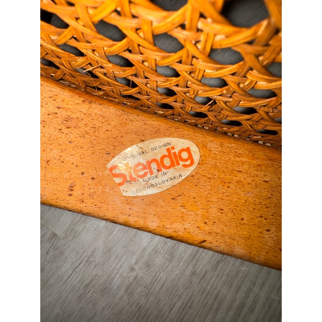 A beautiful set of six vintage bentwood dining chairs in the style of Josef Hoffmann, featuring classic curved frames and...