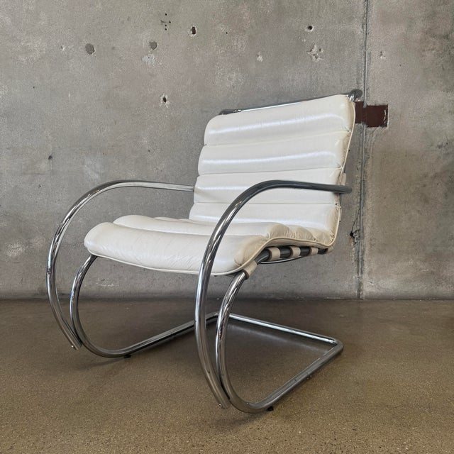 An exceptional piece of early modern design, this vintage "MR" lounge armchair with arms was originally designed by iconic...