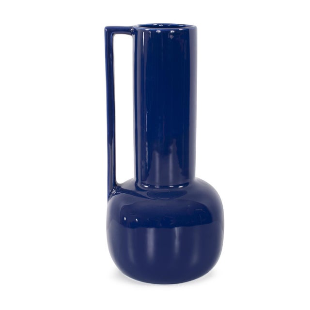 This ceramic pitcher features a cylindrical shape and is versatile for various occasions. Each pitcher is adorned with a...
