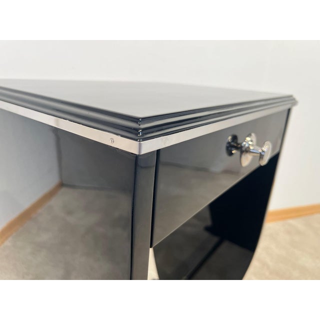 Elegant small art deco side table or bedside table from france around 1930. High quality restoration with black high gloss...