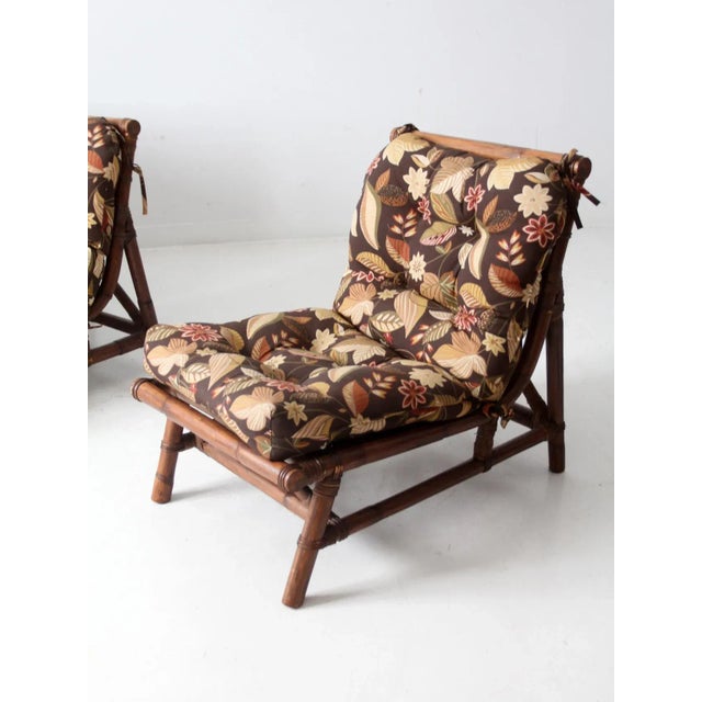 This is a mid 20th century Calif-Asia rattan sectional couch and lounge chair set often attributed to designer Milo...