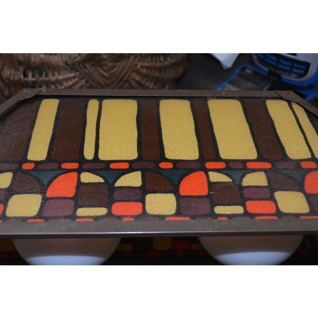 This light is in good condition. Eames era by Underwriters Laboratories. 1960's fun slag glass with 2 glass globes. Great...