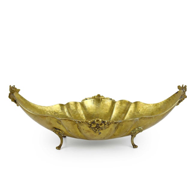 Exuding Mid-Century sophistication, this vintage Italian hand-hammered brass centerpiece bowl is a quintessential example...