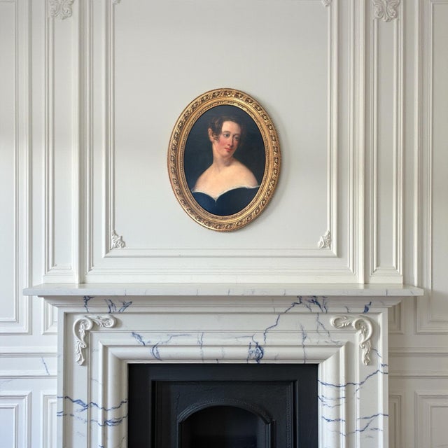 A refined English School (19th century) portrait of a lady, painted in oil on canvas and later laid to board. The sitter’s...