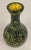 Italian mid-century glass vase, stunning green and yellow glass vase. This handcrafted glass vase is small in scale, yet,...