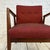 Mid-Century Modern Jen Risom Lounge Armchair The chair, features, walnut arms and frame and upholstered red and black...