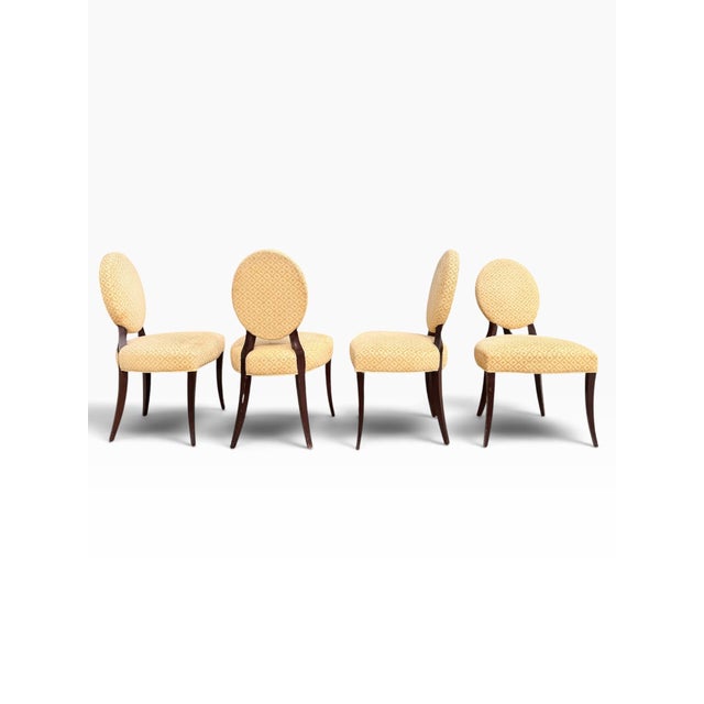 Set of 4 Barbara Barry for Baker chairs with solid mahogany frames in a Java finish. Made in USA Circa Late 20th Century...