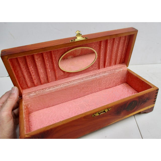 Pine case with pink silk jacquard fabric. The measurements are 13", and 5 "by 4". The Art Deco transfer medallion is an...