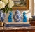 A wonderfully decorative pair of mid-20th century porcelain guardian lions, or foo dogs, finished in a vivid turquoise...