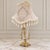 Exquisite French-style crystal table lamp featuring a uniquely shaped romantic silhouette adorned with elegant hanging...