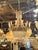 This Early 19th century French Empire Basket Chandelier features a stunning Greek Key Motif design, adding a touch of...