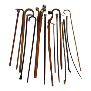 A Collection of Twelve Antique Walking Sticks/Canes With Three Crops