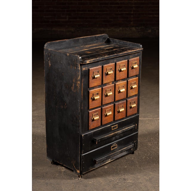 Industrial Early 20th Century Wooden 14 Drawer Rolling Shop Cabinet in Distressed Black For Sale - Image 3 of 10