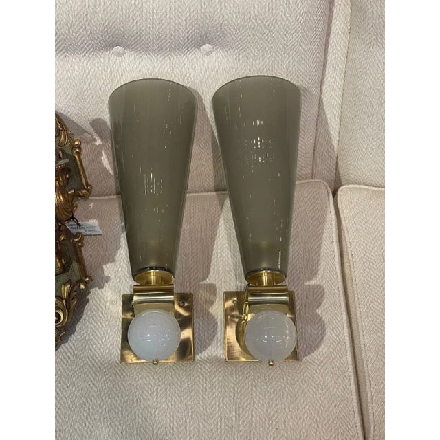 Elegant pair of modern Murnano glass and brass cone form sconces. Beautiful greyish/green color and nice decorative...