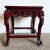This exquisite Chinese side table features intricate hand-carved rosewood, showcasing traditional craftsmanship. The...