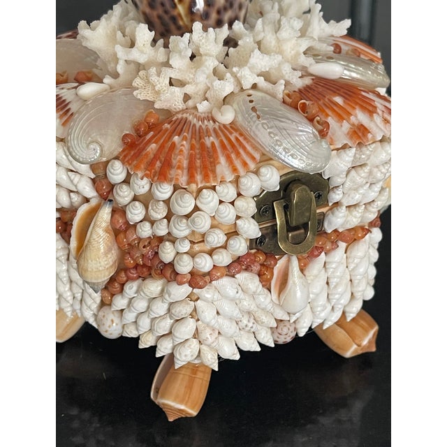 Unique design one of a kind sea Shell encrusted treasure box with white coral branches.