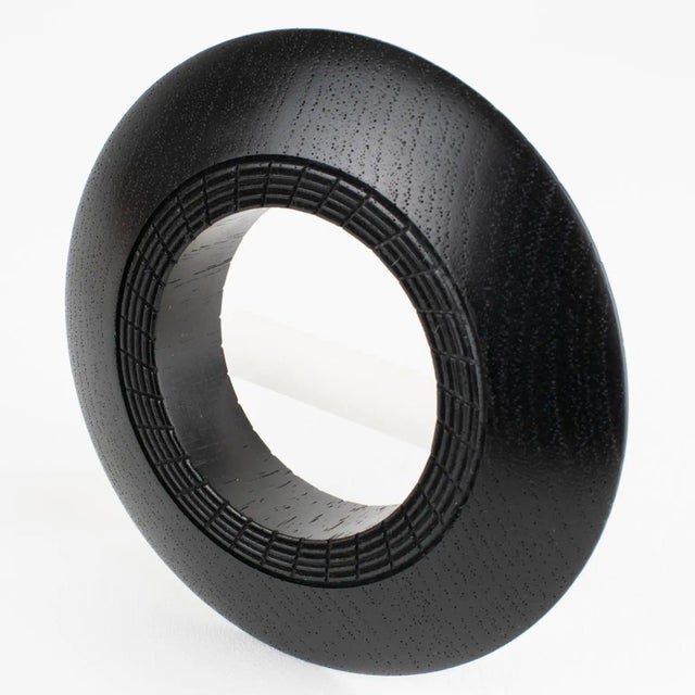 This stunning, Christian Dior, ethnic-inspired wood bracelet is a rare find. The important flying saucer-shaped bangle is...