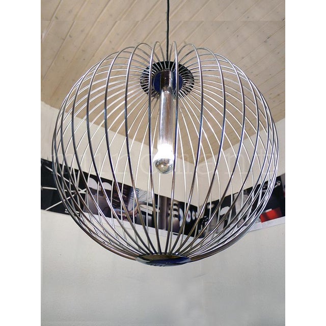 Oversized object lamp with finely chrome plated branches ending in an orbital ball. This string pendant light will draw...