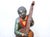 An impressive figure of jazz musician double bass player. Big, noticeable, attention grabbing. It is so vintage, so jazz,...