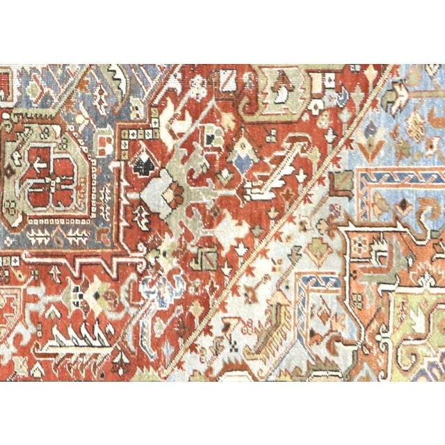 1940s Persian Heriz Rug. Hand woven in the Mahal region of Iran. Distressed and refinished in the U.S. The Persian carpet...