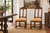 A carved shell crest rises between two turned finials on each of these chairs, above a pair of curved slats that give the...