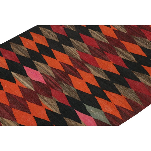 This vintage 2'3''x10'1'' Persian Kilim is a tribal Karadagh rug — named after the mountainous region known for its...